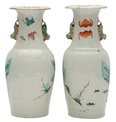 Lot 501 - A pair of Chinese famille-rose 'figural' vases, Qing dynasty, 19th century