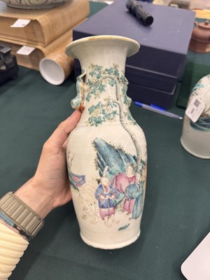 Lot 501 - A pair of Chinese famille-rose 'figural' vases, Qing dynasty, 19th century