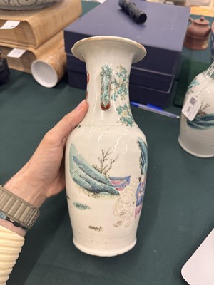 Lot 501 - A pair of Chinese famille-rose 'figural' vases, Qing dynasty, 19th century