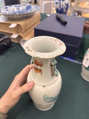 Lot 501 - A pair of Chinese famille-rose 'figural' vases, Qing dynasty, 19th century