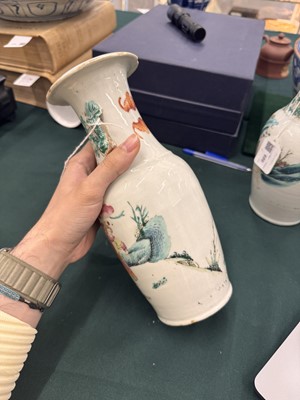 Lot 501 - A pair of Chinese famille-rose 'figural' vases, Qing dynasty, 19th century