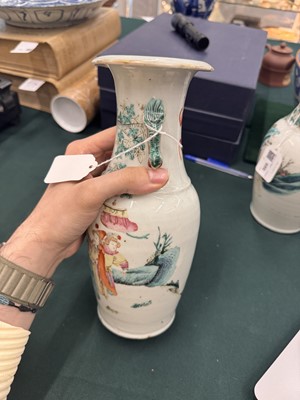 Lot 501 - A pair of Chinese famille-rose 'figural' vases, Qing dynasty, 19th century