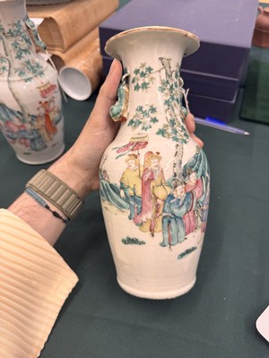 Lot 501 - A pair of Chinese famille-rose 'figural' vases, Qing dynasty, 19th century