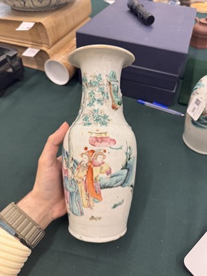 Lot 501 - A pair of Chinese famille-rose 'figural' vases, Qing dynasty, 19th century