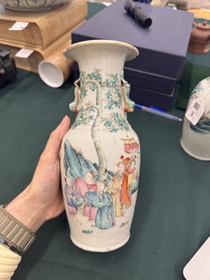 Lot 501 - A pair of Chinese famille-rose 'figural' vases, Qing dynasty, 19th century