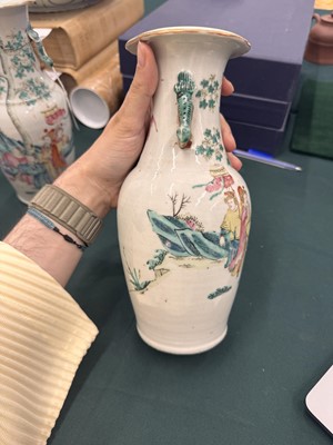 Lot 501 - A pair of Chinese famille-rose 'figural' vases, Qing dynasty, 19th century