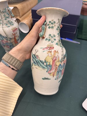 Lot 501 - A pair of Chinese famille-rose 'figural' vases, Qing dynasty, 19th century