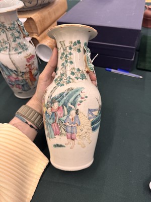 Lot 501 - A pair of Chinese famille-rose 'figural' vases, Qing dynasty, 19th century