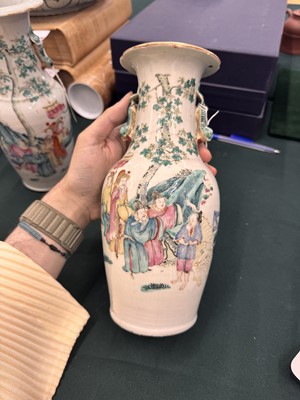 Lot 501 - A pair of Chinese famille-rose 'figural' vases, Qing dynasty, 19th century