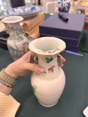 Lot 501 - A pair of Chinese famille-rose 'figural' vases, Qing dynasty, 19th century