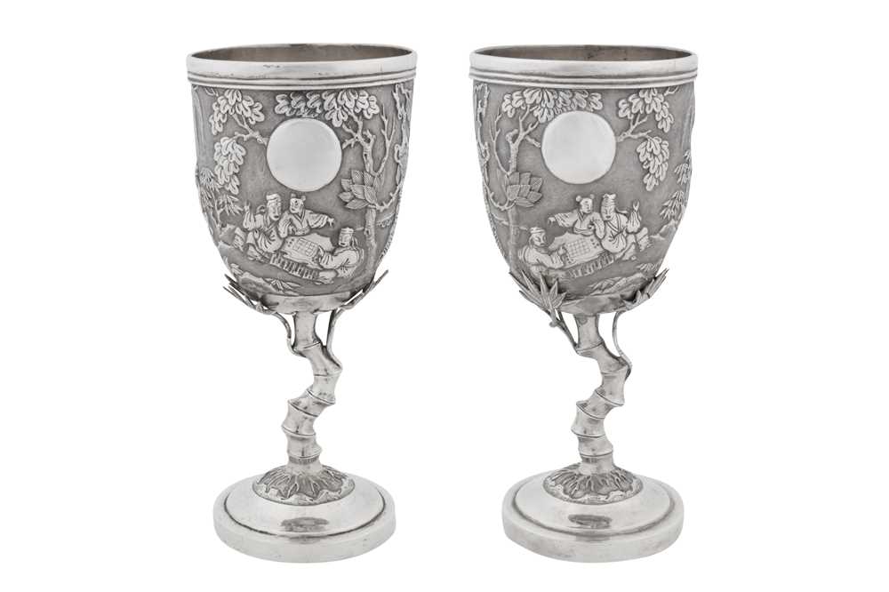 Lot 225 - A pair of early 20th century Chinese export silver goblets, Canton circa 1910, marked Pei Ji, retailed by Tian Sheng of Hong Kong