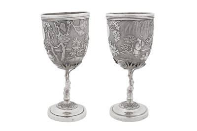 Lot 225 - A pair of early 20th century Chinese export silver goblets, Canton circa 1910, marked Pei Ji, retailed by Tian Sheng of Hong Kong