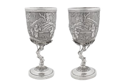 Lot 225 - A pair of early 20th century Chinese export silver goblets, Canton circa 1910, marked Pei Ji, retailed by Tian Sheng of Hong Kong