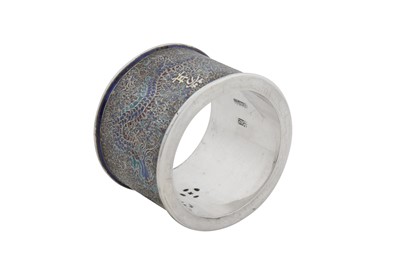 Lot 223 - An early 20th century Chinese export parcel gilt silver and enamel napkin ring, Peking (Beijing) circa 1920, marked Zhou He Zhang
