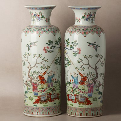 Lot 630 - A pair of large Chinese famille-rose 'boys' vases, 20th century