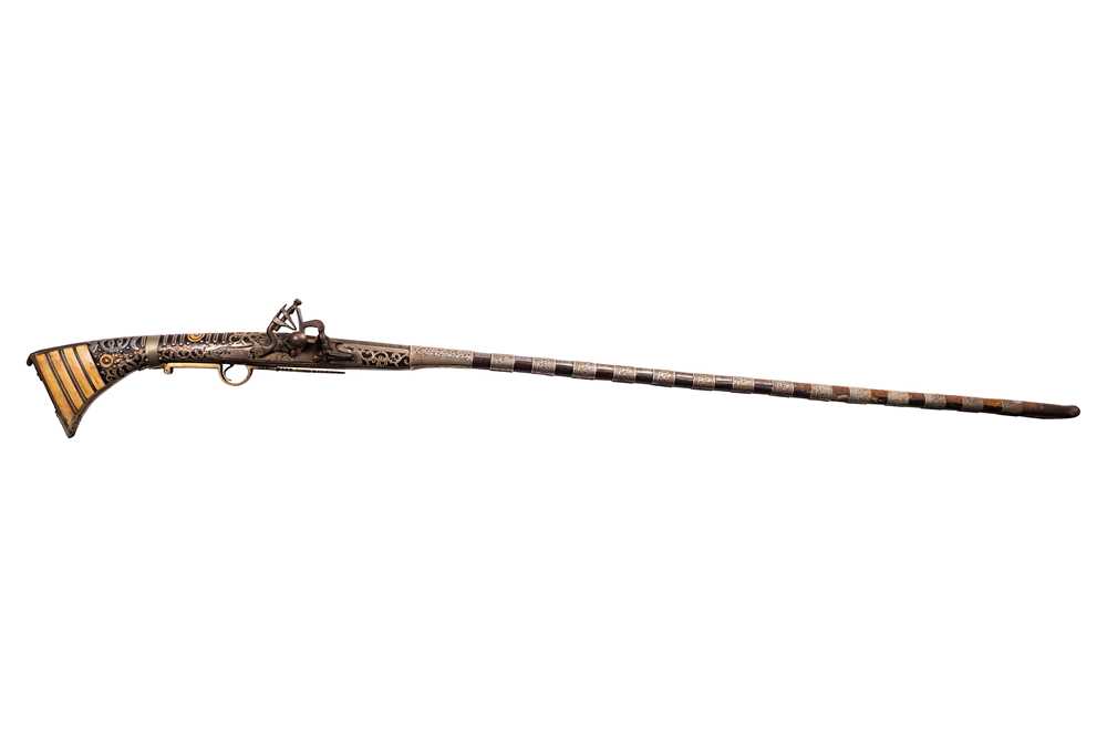 Lot 187 - A North African (possibly Moroccan) longarm snaphance Rifle (or Moukahla)