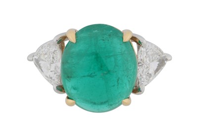 Lot 109 - An emerald and diamond three-stone ring