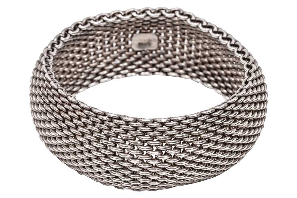 Lot 327 - TIFFANY & CO. | A MESH BANGLE