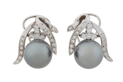 Lot 175 - A pair of pearl and diamond earrings