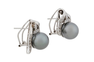 Lot 175 - A pair of pearl and diamond earrings
