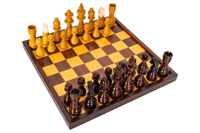 Lot 437 - A Staunton pattern chess set and board