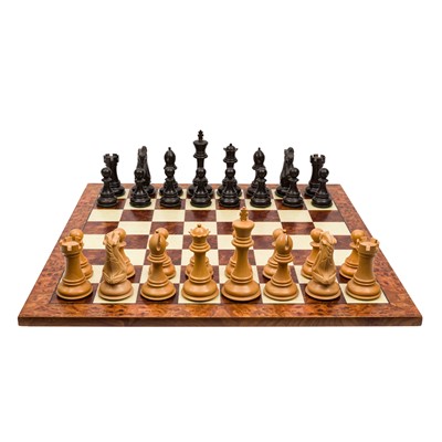 Lot 437 - A Staunton pattern chess set and board