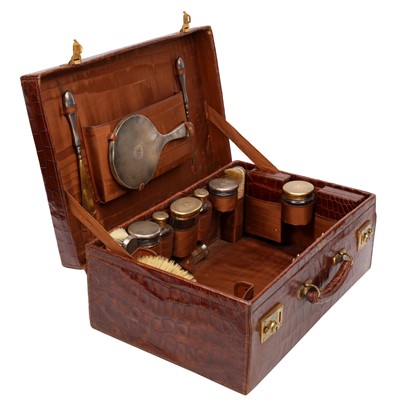 Lot 610 - A George V sterling silver gilt fitted travelling vanity or dressing case, London 1925 by Drew and Sons