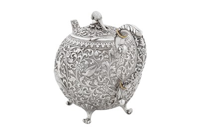 Lot 174 - A rare early 20th century Anglo – Indian silver teapot, Cutch, Bhuj circa 1910 by Oomersi Mawji jnr (active 1890-1930)