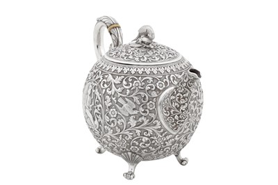 Lot 174 - A rare early 20th century Anglo – Indian silver teapot, Cutch, Bhuj circa 1910 by Oomersi Mawji jnr (active 1890-1930)