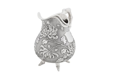 Lot 226 - An early 20th century Chinese export silver three-piece tea service, Canton or Hong Kong circa 1910, marked De Long