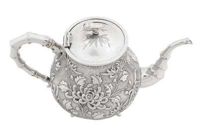 Lot 226 - An early 20th century Chinese export silver three-piece tea service, Canton or Hong Kong circa 1910, marked De Long