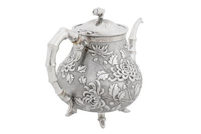 Lot 226 - An early 20th century Chinese export silver three-piece tea service, Canton or Hong Kong circa 1910, marked De Long