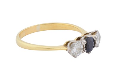 Lot 64 - A sapphire and diamond three stone ring
