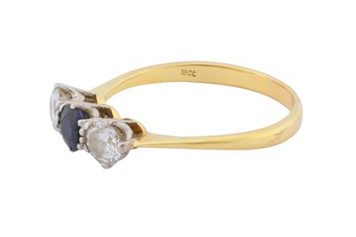 Lot 64 - A sapphire and diamond three stone ring