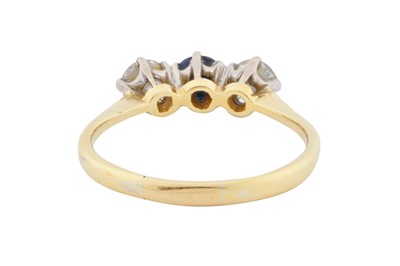 Lot 64 - A sapphire and diamond three stone ring