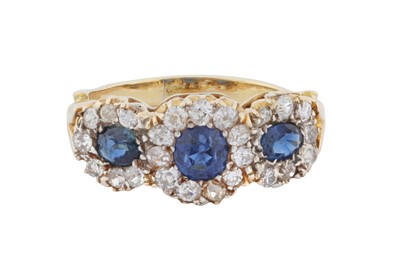 Lot 15 - A sapphire and diamond triple cluster ring