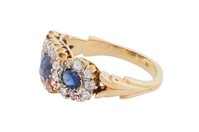 Lot 15 - A sapphire and diamond triple cluster ring