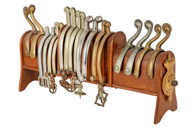 Lot 193 - A Victorian oak spur stand