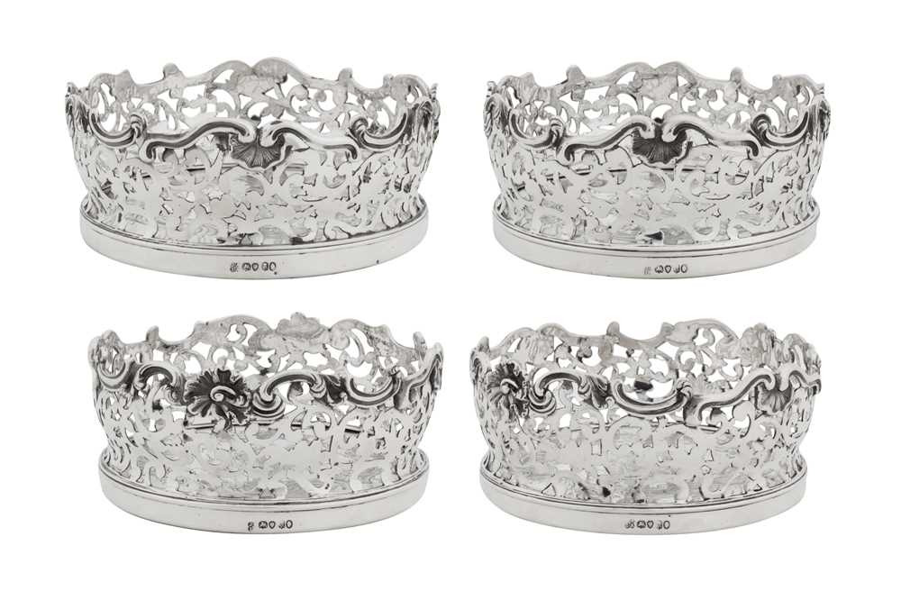 Lot 428 - A set of four William IV sterling silver wine coasters, London 1836 by Joseph Angell I and John Angell I
