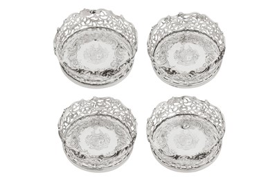 Lot 428 - A set of four William IV sterling silver wine coasters, London 1836 by Joseph Angell I and John Angell I