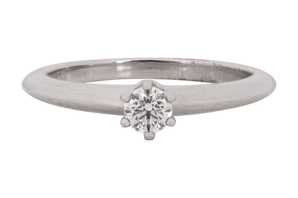 Lot 192 - Tiffany & Co Ι A single-stone diamond ring