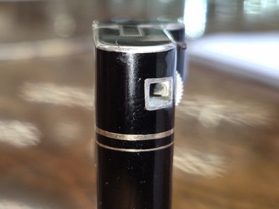 Lot 72 - An early 20th century French Art Deco 950 standard silver gilt and lacquer lighter, Paris circa 1920, retailed by Cartier