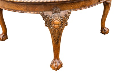 Lot 35 - A late Victorian figured walnut extending dining table by Maple & Co., circa 1890