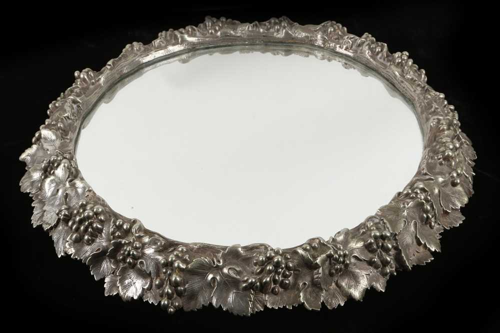 Lot 433 - An antique silver plated mirror plateau table...