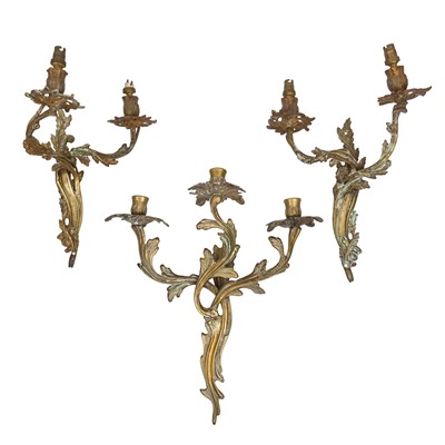 Lot 247 - A rococo style bronze three branch wall sconce