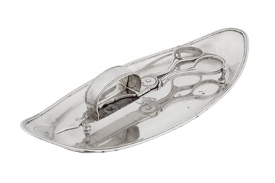Lot 443 - A George III sterling silver snuffers or wick trimmers on tray, the tray London 1788 by Robert Hennell II