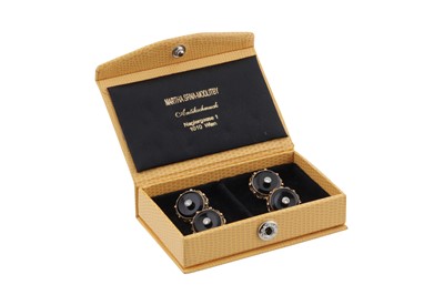 Lot 489 - A pair of onyx & diamond cufflinks