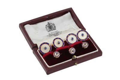 Lot 488 - A mother of pearl, sapphire and enamel dress set, circa 1984-1985