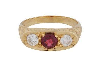Lot 131 - A garnet and diamond three-stone ring, circa 2024
