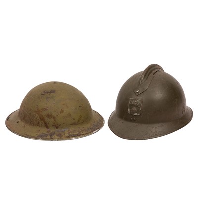 Lot 195 - Two WWI period military issue helmets